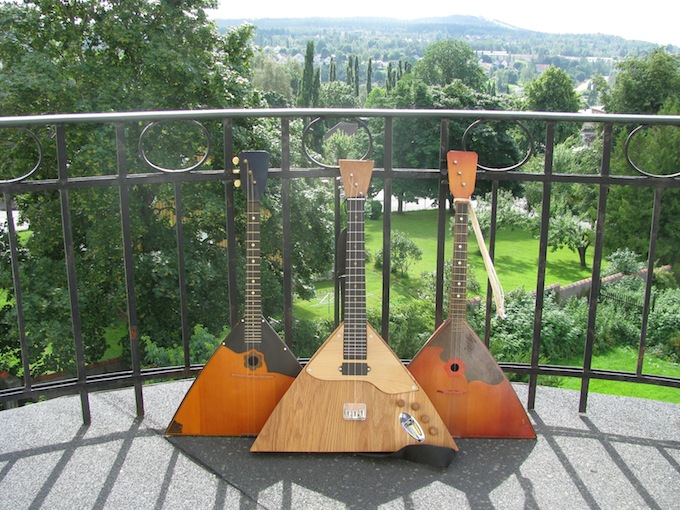 Two acoustic balalaikas and one electric balalaika.